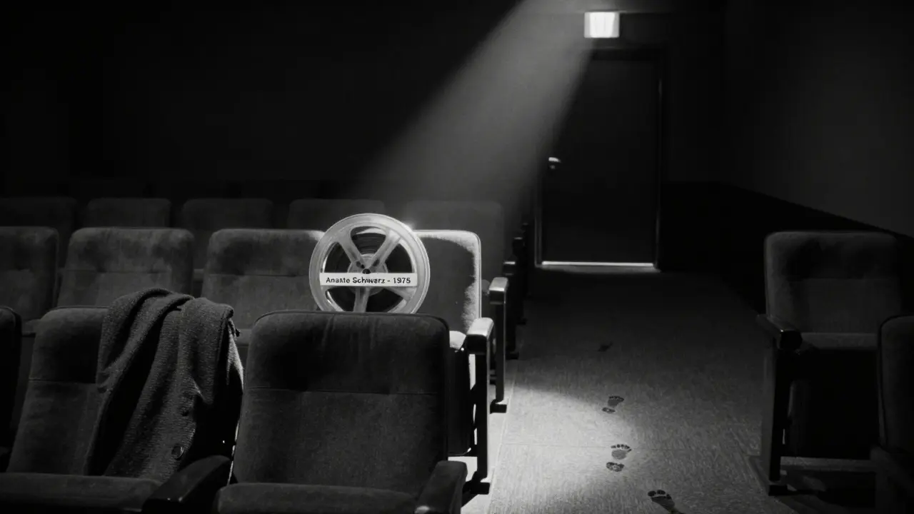 An empty film chair in a dark archive room, a single reel labeled 'Annette Schwarz' under a beam of light.